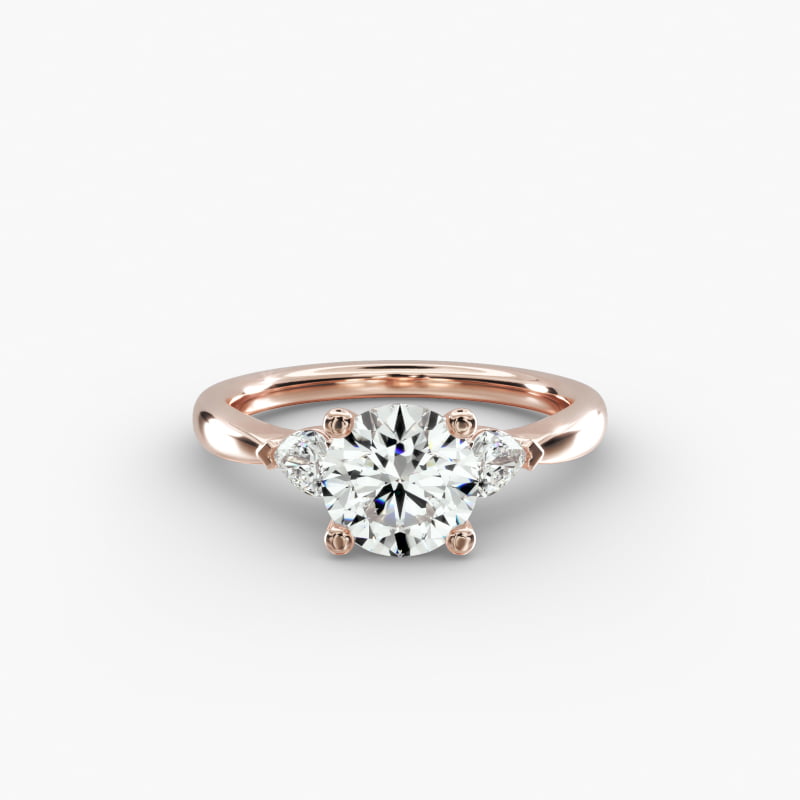 Pear Sidestone Lab-Grown Diamond Engagement Ring in 14k Rose Gold (1/4 ct. tw.)