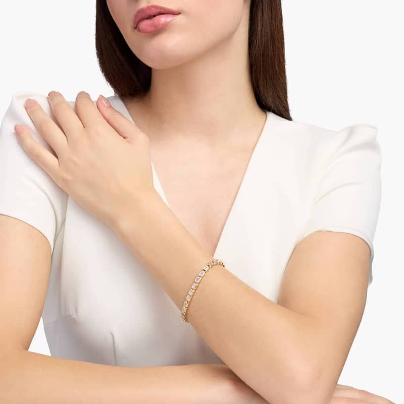 7 " Emerald Cut Lab Grown Diamond  E/W Bezel Set Tennis Bracelet In 14K Yellow Gold (10 Ct. tw. - F-G / VS2-SI1)