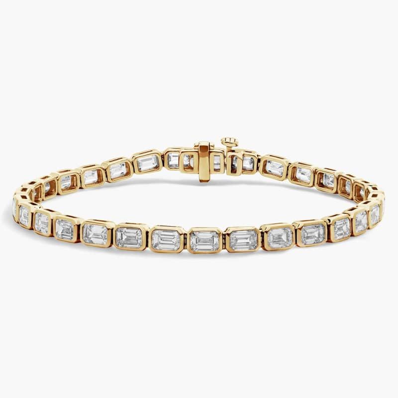 7 " Emerald Cut Lab Grown Diamond  E/W Bezel Set Tennis Bracelet In 14K Yellow Gold (10 Ct. tw. - F-G / VS2-SI1)