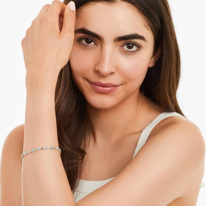 Blue Topaz Line Bracelet In 14K Yellow Gold