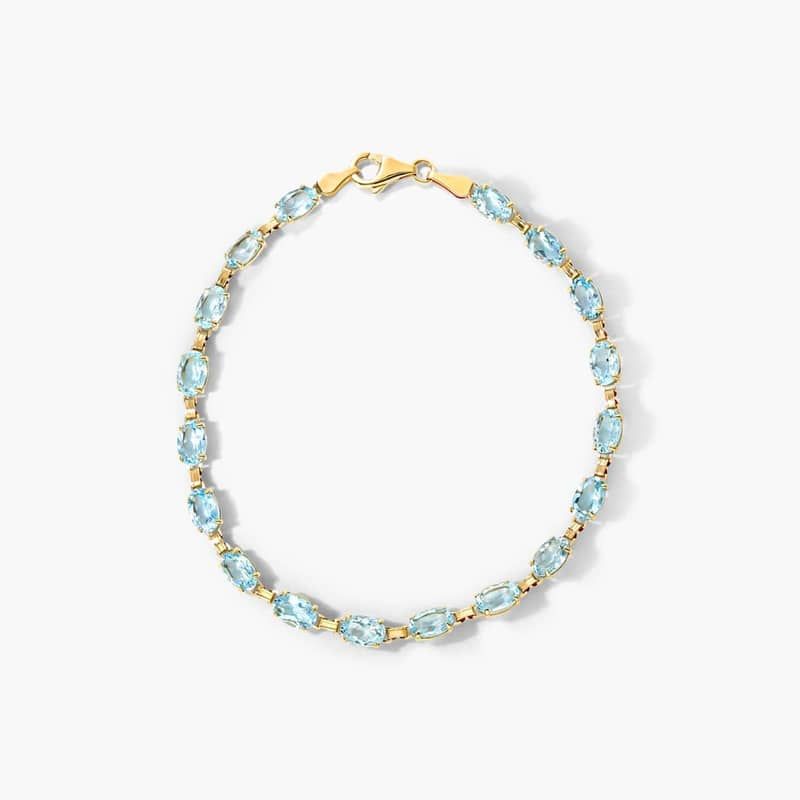 Blue Topaz Line Bracelet In 14K Yellow Gold
