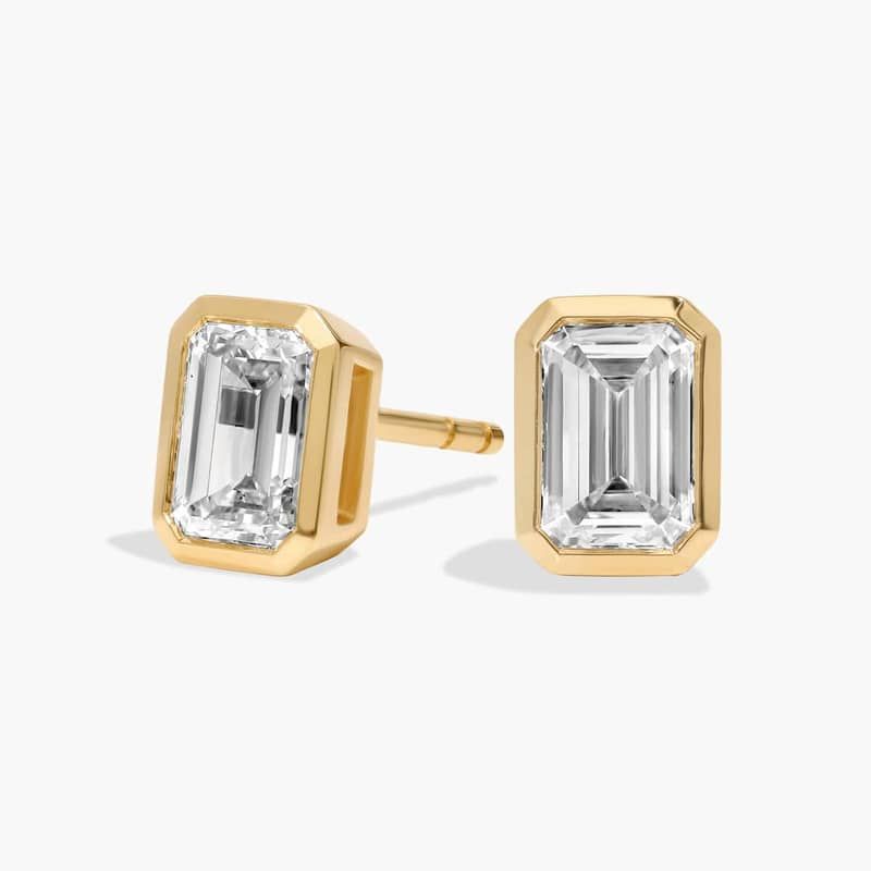Bezel Set Emerald Cut Lab-Grown Diamond Stud Earrings In 14K Yellow Gold (2 Ct. tw. - F-G / VS2-SI1)