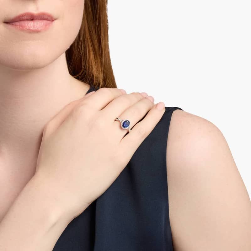 Oval Sapphire and Diamond Halo Twist Ring in 14k White Gold (8x6mm)